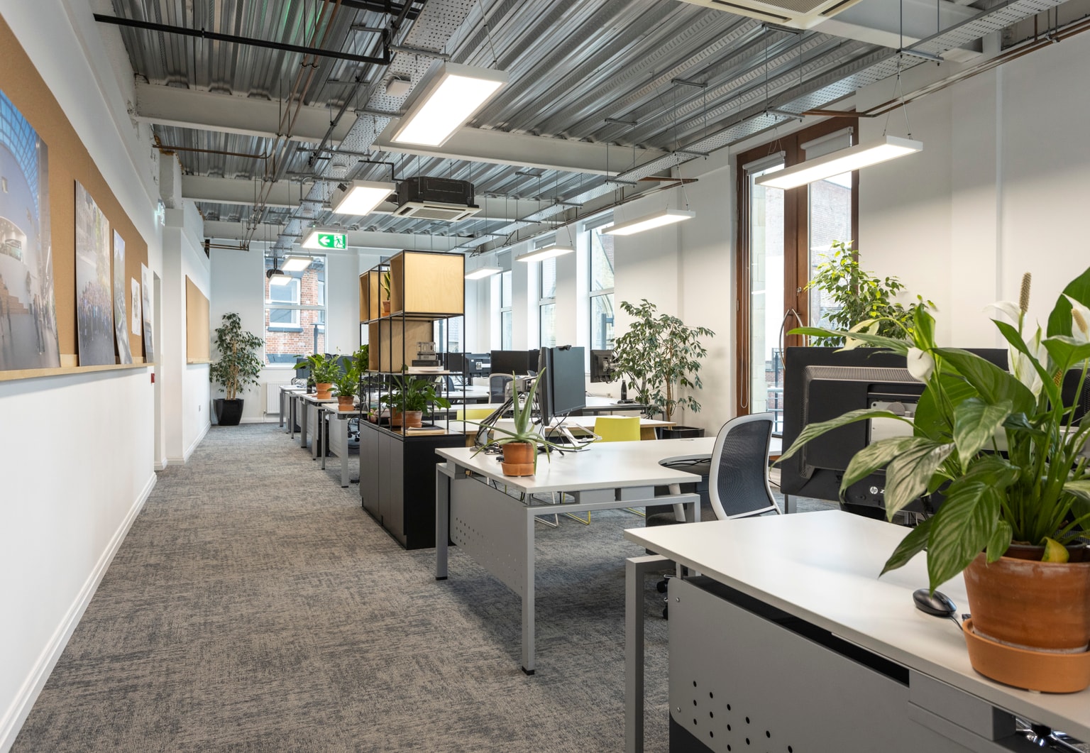 Image of open plan office space with desks