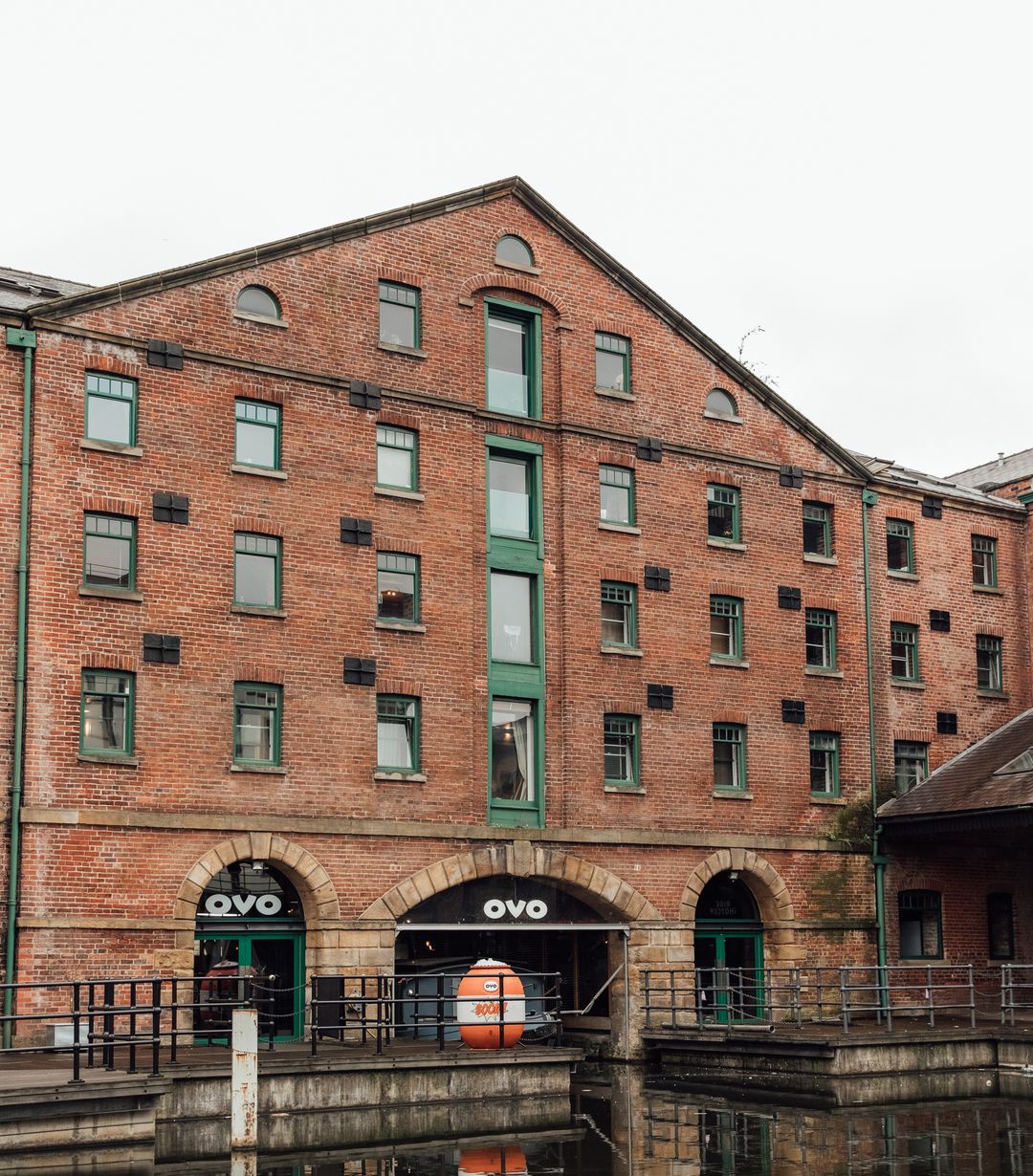 Image of the back of the Terminal Warehouse building at Victoria Quays and the Ovo Office