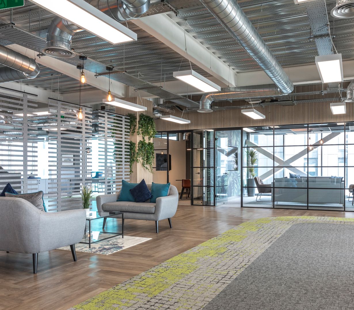 Images of Unihomes office including pool table, office desks and communal areas