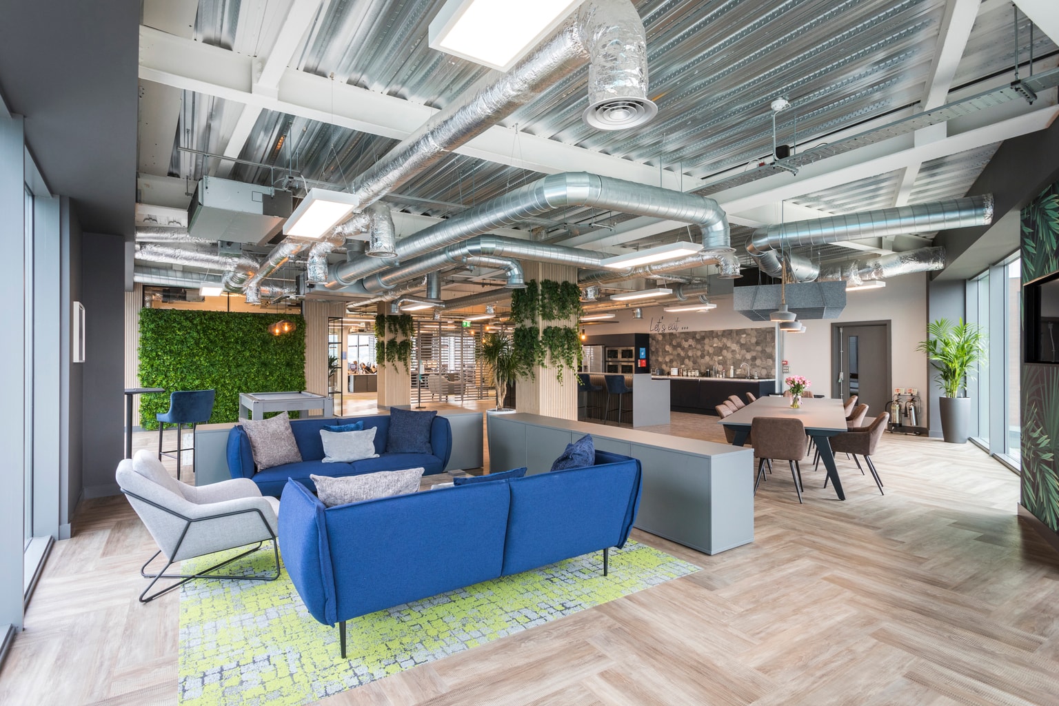 Images of Unihomes office including pool table, office desks and communal areas