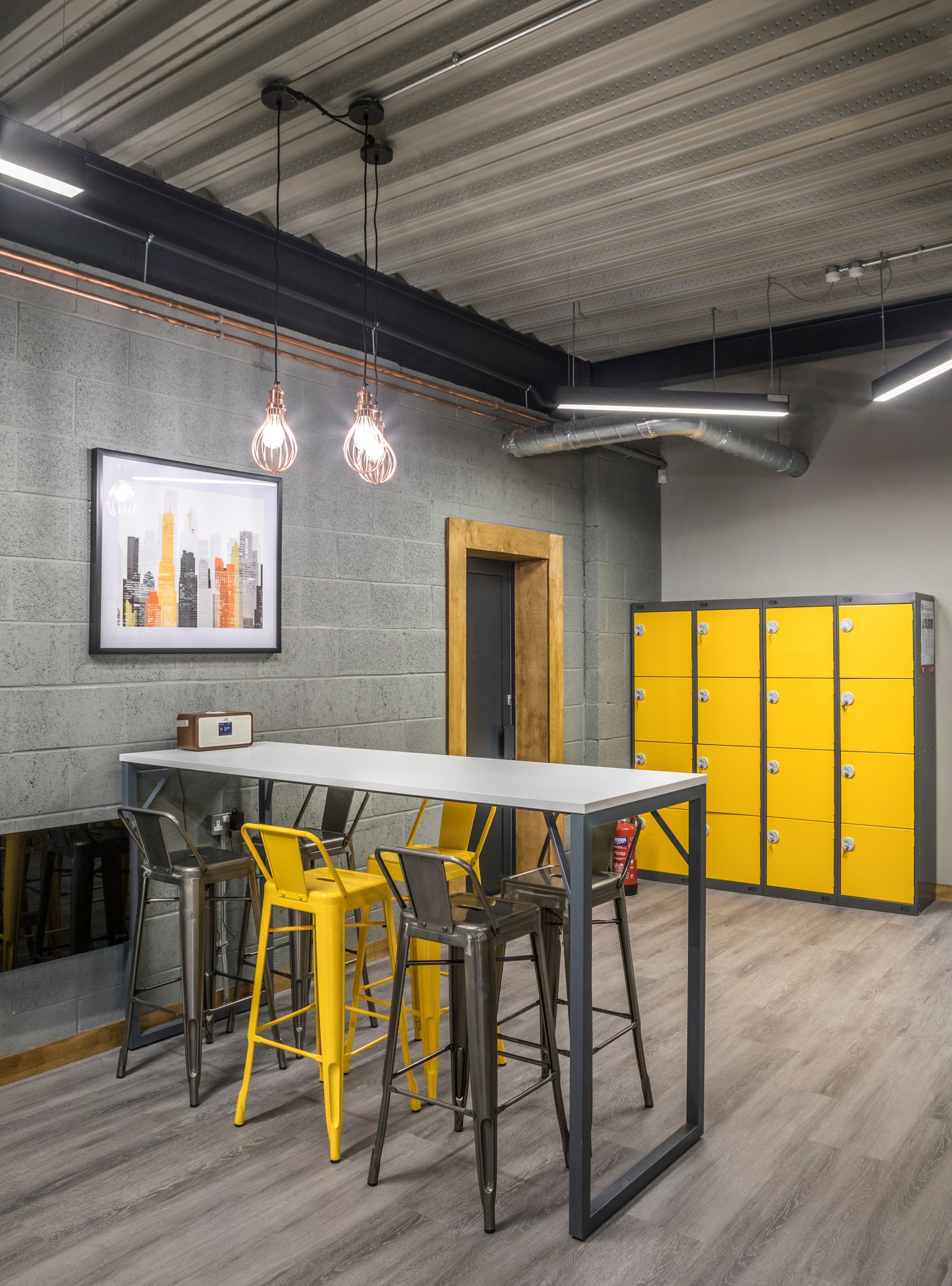 Image of kitchenette tale and storage lockers